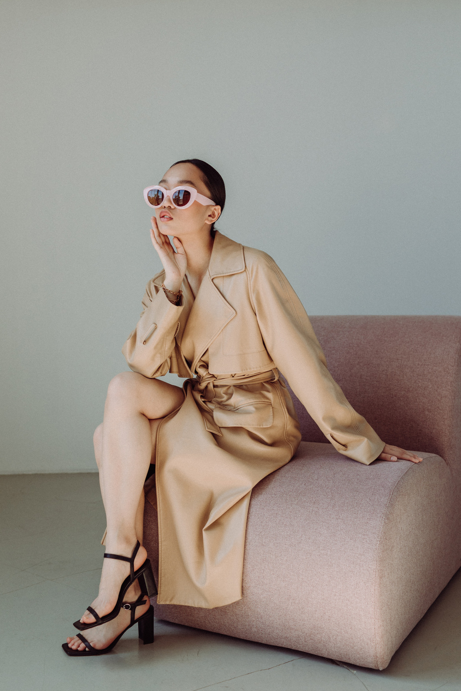 Stylish Woman in Coat and Sunglasses